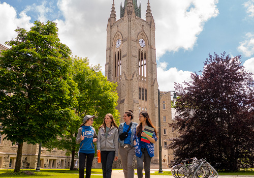 Students walking in front of Ursuline Hall